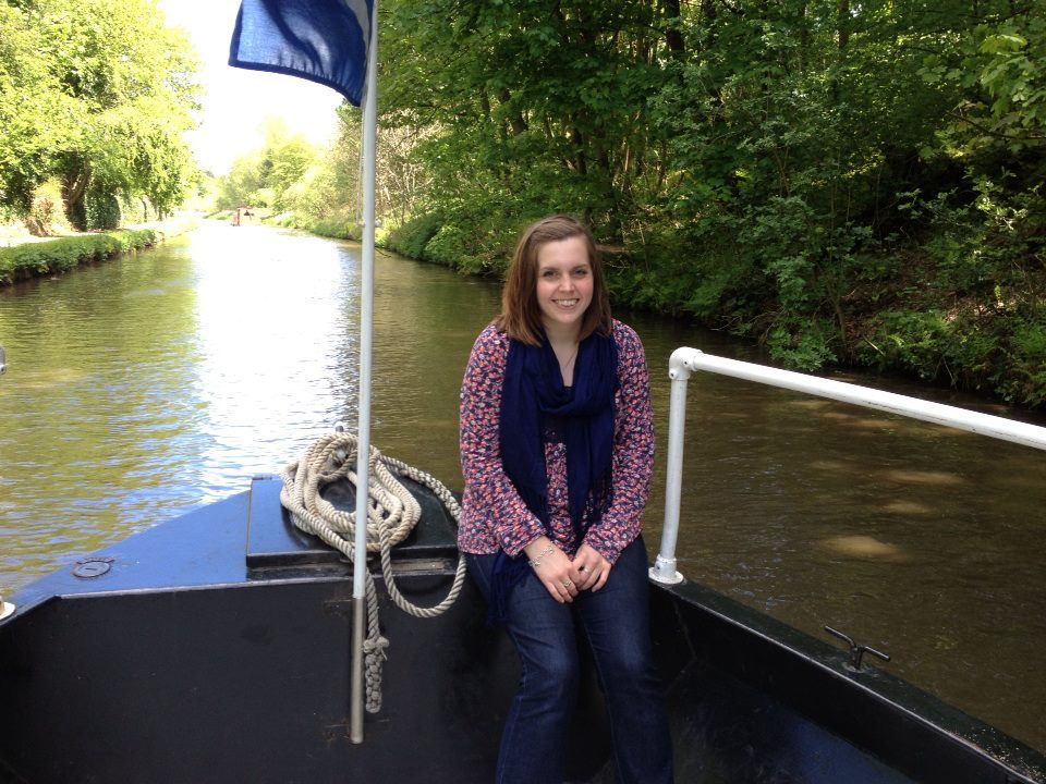 A woman from St David's Bradbury Day Centre in Edinburgh sat on the bow of a canal barge