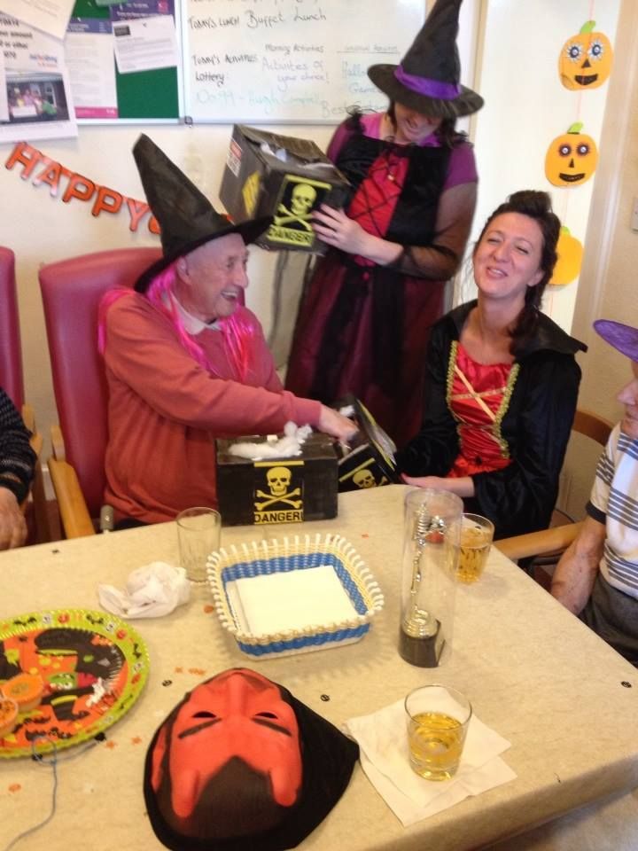 A picture of an elderly man celebrating Halloween with staff at St David's Bradbury in Midlothian